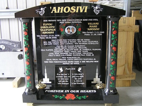 PACIFIC TEMPLE HEADSTONE WITH BIBLE RECUMBENT